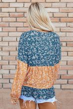 Load image into Gallery viewer, Orange Floral Color Block Ruffled Hem Round Neck Blouse