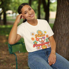 Load image into Gallery viewer, Person wearing a white t-shirt with colorful graphics and text, sitting on a chair.