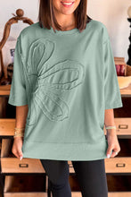 Load image into Gallery viewer, Clearly Aqua Floral Patched Half Sleeve Tunic Top