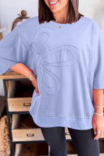 Load image into Gallery viewer, Clearly Aqua Floral Patched Half Sleeve Tunic Top